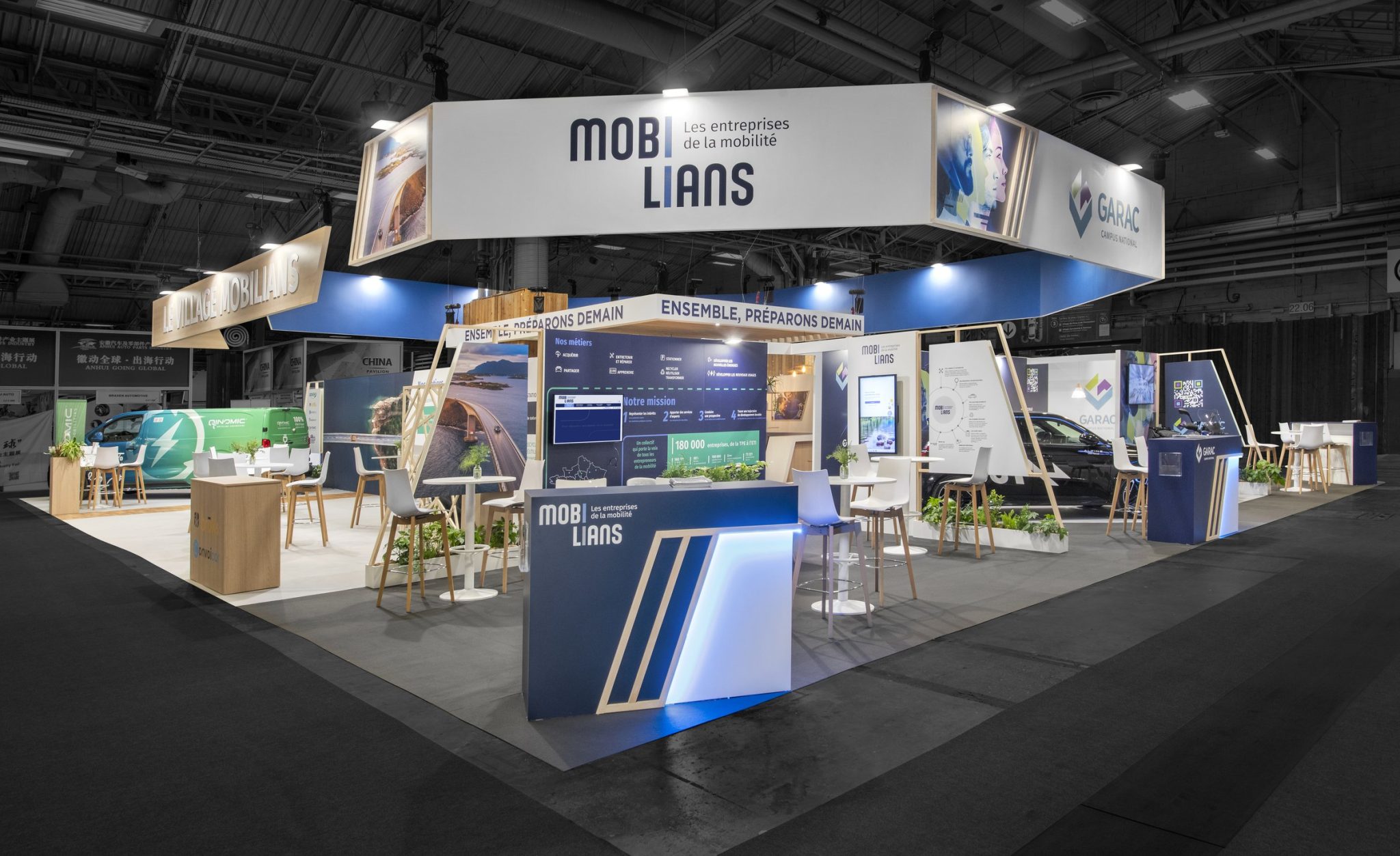 Angle photo of the Mobilians exhibitor village created by the R2 Stand agency with multiple custom-designed spaces